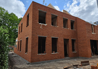 Ruwbouw vrijstaande gezinswoning — Zegersdreef: gevelsteen